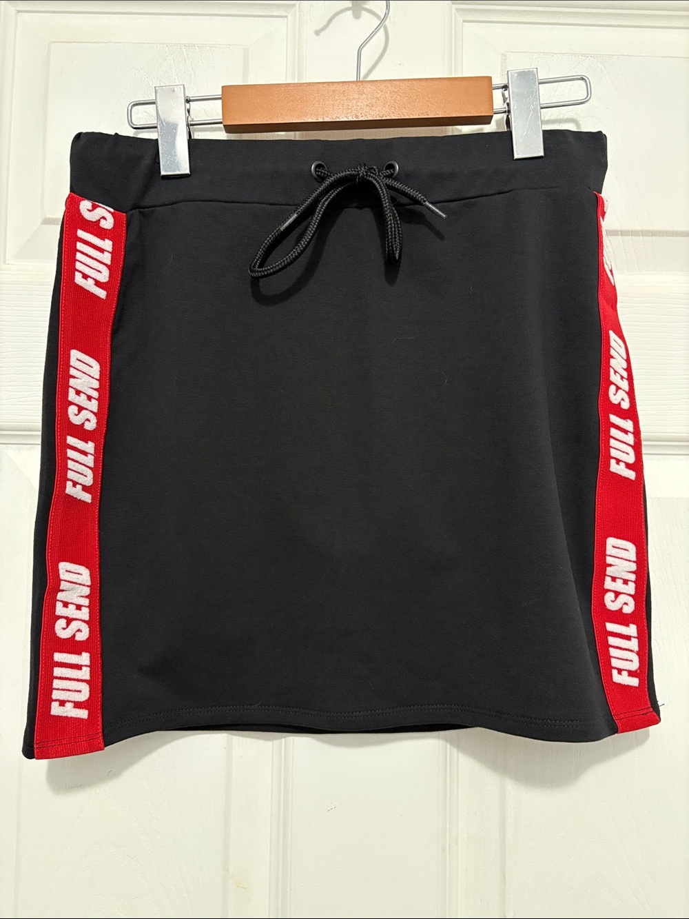 Full Send Black Mini Skirt with Red Branded Side Tape